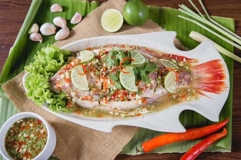 Discover the mouthwatering Pla Nueng Manow in Pattaya - a steamed fish with spicy lime sauce. Find out where to try it and more!